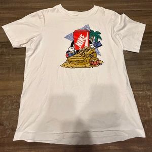 White Nike graphic tee. Size youth large (boys). Worn once.